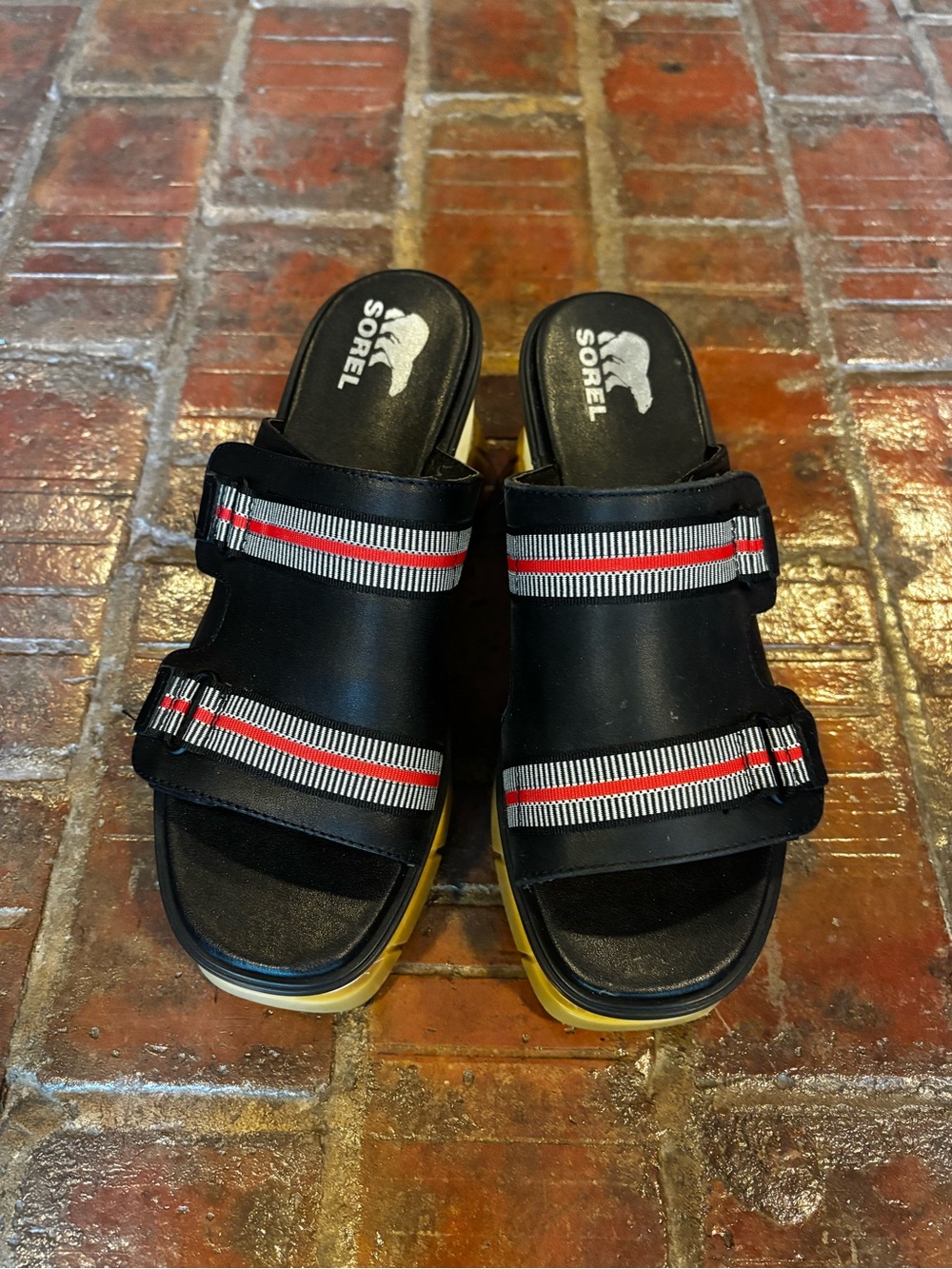 Sorel Black Slide Sandals with Red and White Striped Webbing